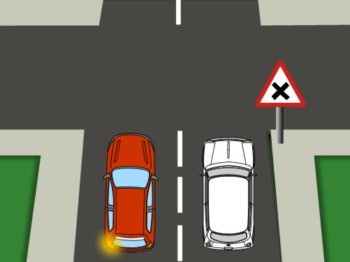 En esta vía de doble sentido, el vehículo rojo, ¿adelanta correctamente?